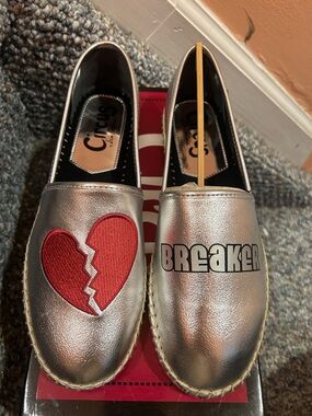Circus by Sam Edelman Silver Slip-Ons with Red Broken Heart Patch